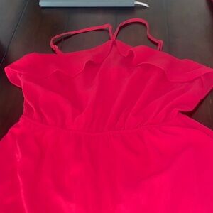 Pink halter romper with ruffles